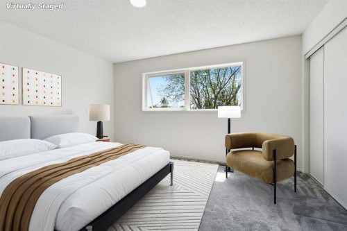 142 Elizabeth Way Se, Airdrie, AB - Indoor Photo Showing Bedroom