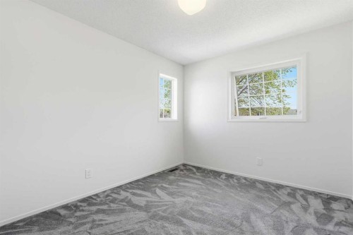 142 Elizabeth Way Se, Airdrie, AB - Indoor Photo Showing Other Room