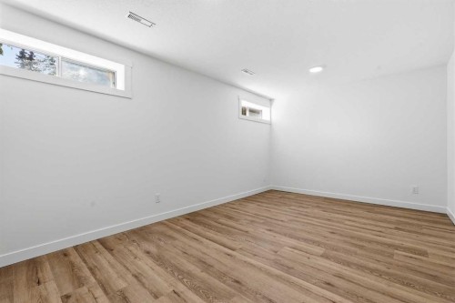 142 Elizabeth Way Se, Airdrie, AB - Indoor Photo Showing Other Room