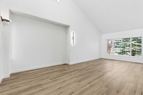 142 Elizabeth Way Se, Airdrie, AB - Indoor Photo Showing Other Room