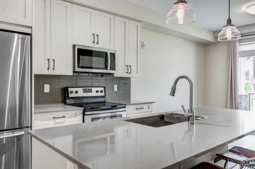120-20 Walgrove Walk Se, Calgary, AB - Indoor Photo Showing Kitchen With Stainless Steel Kitchen With Upgraded Kitchen