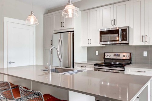 120-20 Walgrove Walk Se, Calgary, AB - Indoor Photo Showing Kitchen With Stainless Steel Kitchen With Upgraded Kitchen