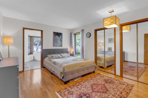 25 Deerfield Manor Se, Calgary, AB - Indoor Photo Showing Bedroom