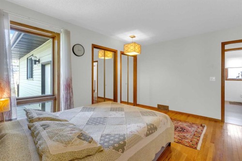 25 Deerfield Manor Se, Calgary, AB - Indoor Photo Showing Bedroom