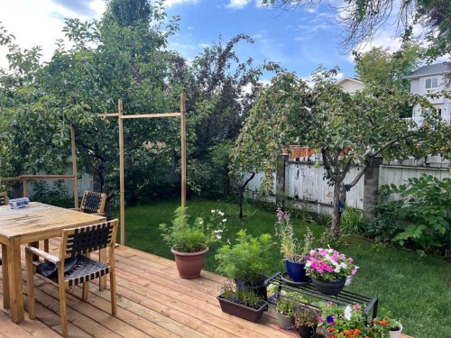 25 Deerfield Manor Se, Calgary, AB - Outdoor With Deck Patio Veranda