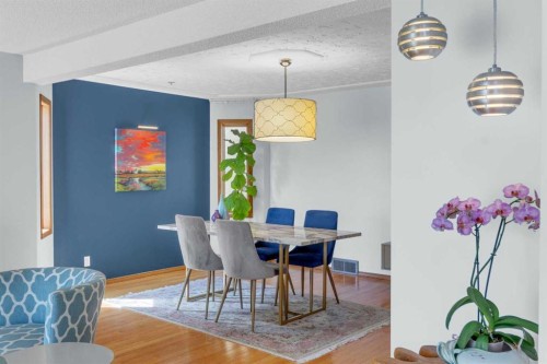25 Deerfield Manor Se, Calgary, AB - Indoor Photo Showing Dining Room