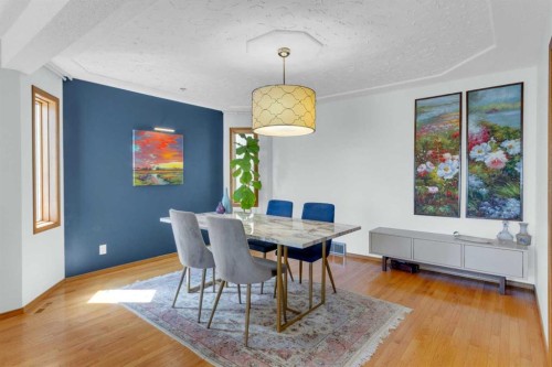 25 Deerfield Manor Se, Calgary, AB - Indoor Photo Showing Dining Room