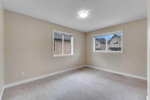 9 Cimarron Vista Gardens, Okotoks, AB - Indoor Photo Showing Other Room