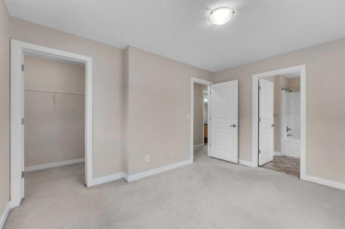 9 Cimarron Vista Gardens, Okotoks, AB - Indoor Photo Showing Other Room