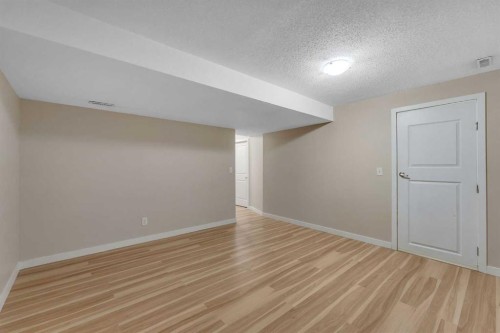9 Cimarron Vista Gardens, Okotoks, AB - Indoor Photo Showing Other Room