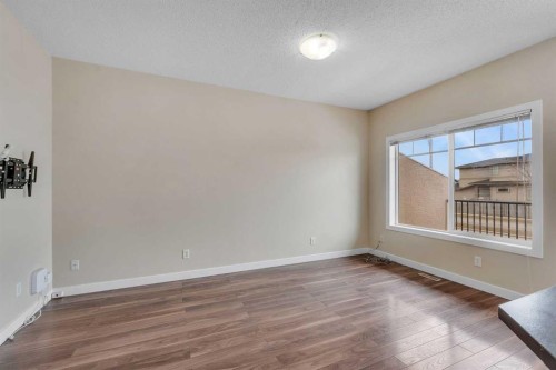 9 Cimarron Vista Gardens, Okotoks, AB - Indoor Photo Showing Other Room