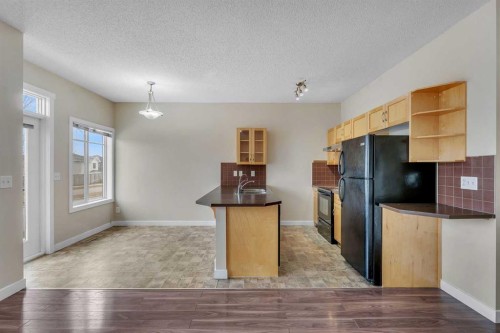 9 Cimarron Vista Gardens, Okotoks, AB - Indoor Photo Showing Kitchen