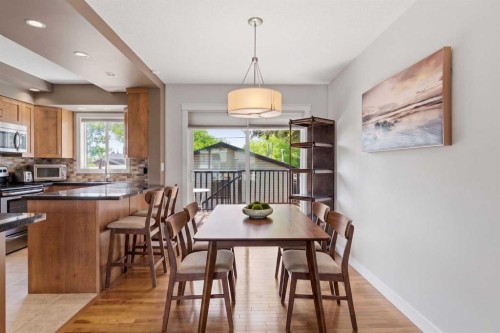 351 Queen Charlotte Road Se, Calgary, AB - Indoor Photo Showing Dining Room