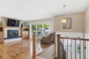 351 Queen Charlotte Road Se, Calgary, AB  - Indoor With Fireplace 