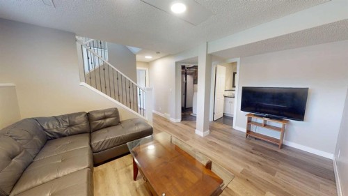 117 Midcrest Crescent Se, Calgary, AB - Indoor Photo Showing Living Room