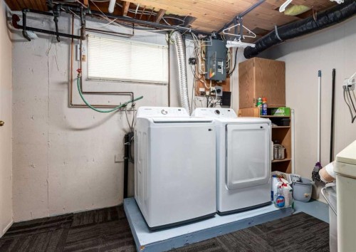 332 Pinemont Road Ne, Calgary, AB - Indoor Photo Showing Laundry Room