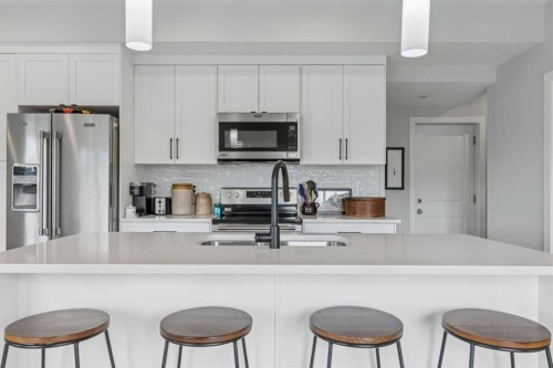 284 Canals Crossing Sw, Airdrie, AB - Indoor Photo Showing Kitchen With Upgraded Kitchen