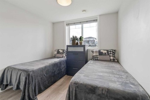 284 Canals Crossing Sw, Airdrie, AB - Indoor Photo Showing Bedroom