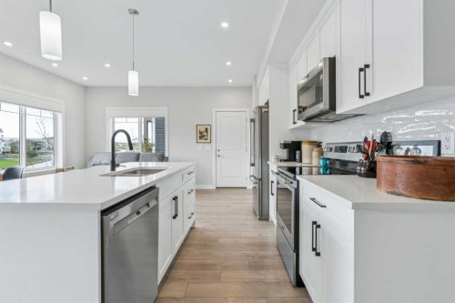284 Canals Crossing Sw, Airdrie, AB - Indoor Photo Showing Kitchen With Upgraded Kitchen
