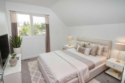 235 Avonburn Road Se, Calgary, AB - Indoor Photo Showing Bedroom