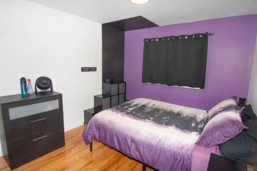 235 Avonburn Road Se, Calgary, AB - Indoor Photo Showing Bedroom