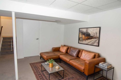 235 Avonburn Road Se, Calgary, AB - Indoor Photo Showing Living Room