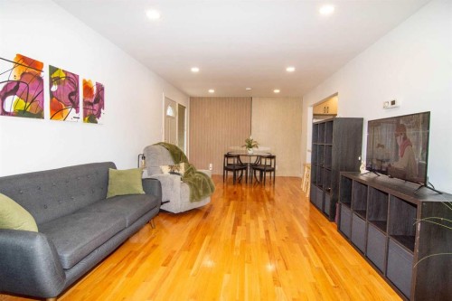 235 Avonburn Road Se, Calgary, AB - Indoor Photo Showing Living Room