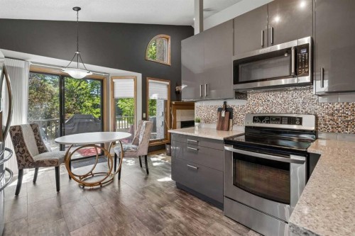 112 Oakbriar Close Sw, Calgary, AB - Indoor Photo Showing Kitchen With Upgraded Kitchen