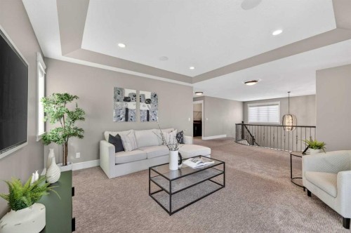 248 Marquis Landing Se, Calgary, AB - Indoor Photo Showing Living Room