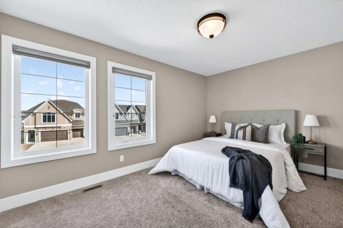 248 Marquis Landing Se, Calgary, AB - Indoor Photo Showing Bedroom