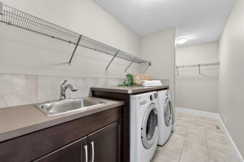 248 Marquis Landing Se, Calgary, AB - Indoor Photo Showing Laundry Room