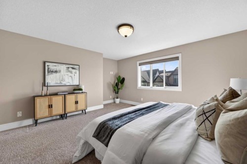 248 Marquis Landing Se, Calgary, AB - Indoor Photo Showing Bedroom