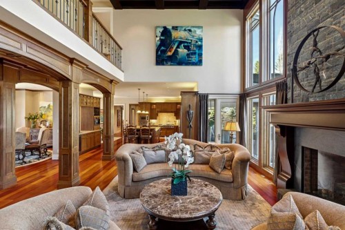 6 Aspen Ridge Lane Sw, Calgary, AB - Indoor Photo Showing Living Room With Fireplace