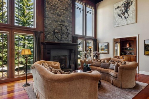 6 Aspen Ridge Lane Sw, Calgary, AB - Indoor Photo Showing Living Room With Fireplace