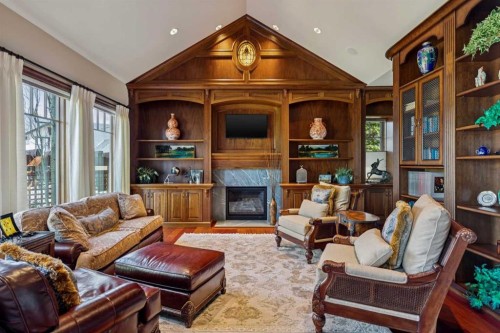 6 Aspen Ridge Lane Sw, Calgary, AB - Indoor Photo Showing Living Room With Fireplace