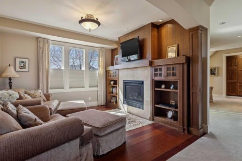6 Aspen Ridge Lane Sw, Calgary, AB - Indoor Photo Showing Living Room With Fireplace