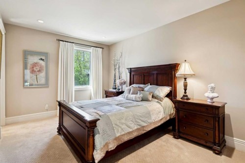 6 Aspen Ridge Lane Sw, Calgary, AB - Indoor Photo Showing Bedroom