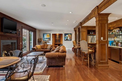 6 Aspen Ridge Lane Sw, Calgary, AB - Indoor Photo Showing Living Room With Fireplace