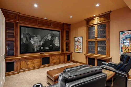 6 Aspen Ridge Lane Sw, Calgary, AB - Indoor Photo Showing Living Room With Fireplace