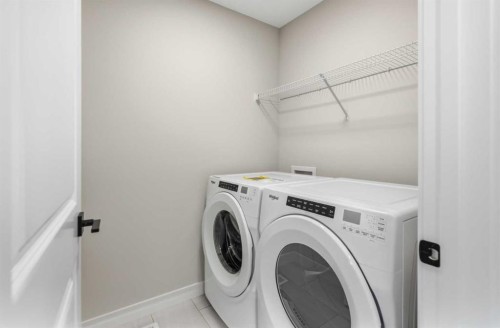 43 Belvedere Crescent Se, Calgary, AB - Indoor Photo Showing Laundry Room