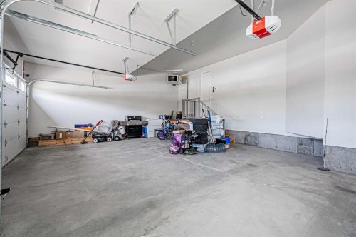 7 Waterford Heights, Chestermere, AB - Indoor Photo Showing Garage