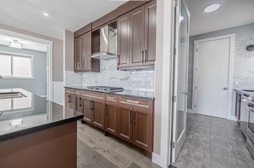 7 Waterford Heights, Chestermere, AB - Indoor Photo Showing Kitchen