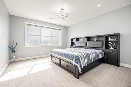 7 Waterford Heights, Chestermere, AB - Indoor Photo Showing Bedroom