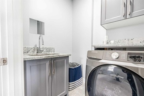 7 Waterford Heights, Chestermere, AB - Indoor Photo Showing Laundry Room