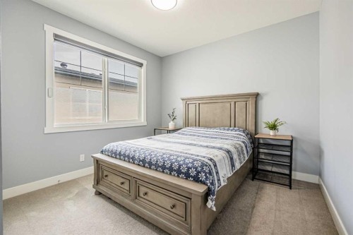 7 Waterford Heights, Chestermere, AB - Indoor Photo Showing Bedroom