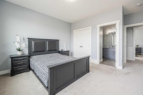 7 Waterford Heights, Chestermere, AB - Indoor Photo Showing Bedroom