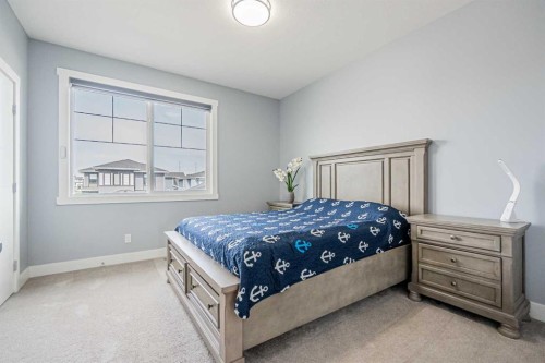 7 Waterford Heights, Chestermere, AB - Indoor Photo Showing Bedroom