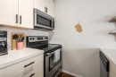 1403-279 Copperpond Common Se, Calgary, AB  - Indoor Photo Showing Kitchen With Stainless Steel Kitchen 
