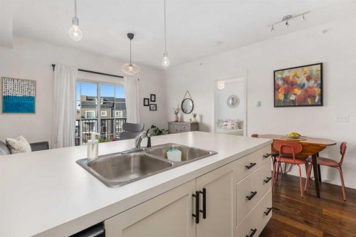 1403-279 Copperpond Common Se, Calgary, AB - Indoor Photo Showing Kitchen With Double Sink