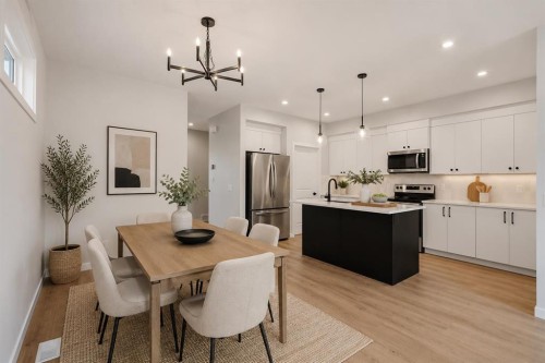 76 Heirloom Drive Se, Calgary, AB - Indoor Photo Showing Kitchen With Upgraded Kitchen